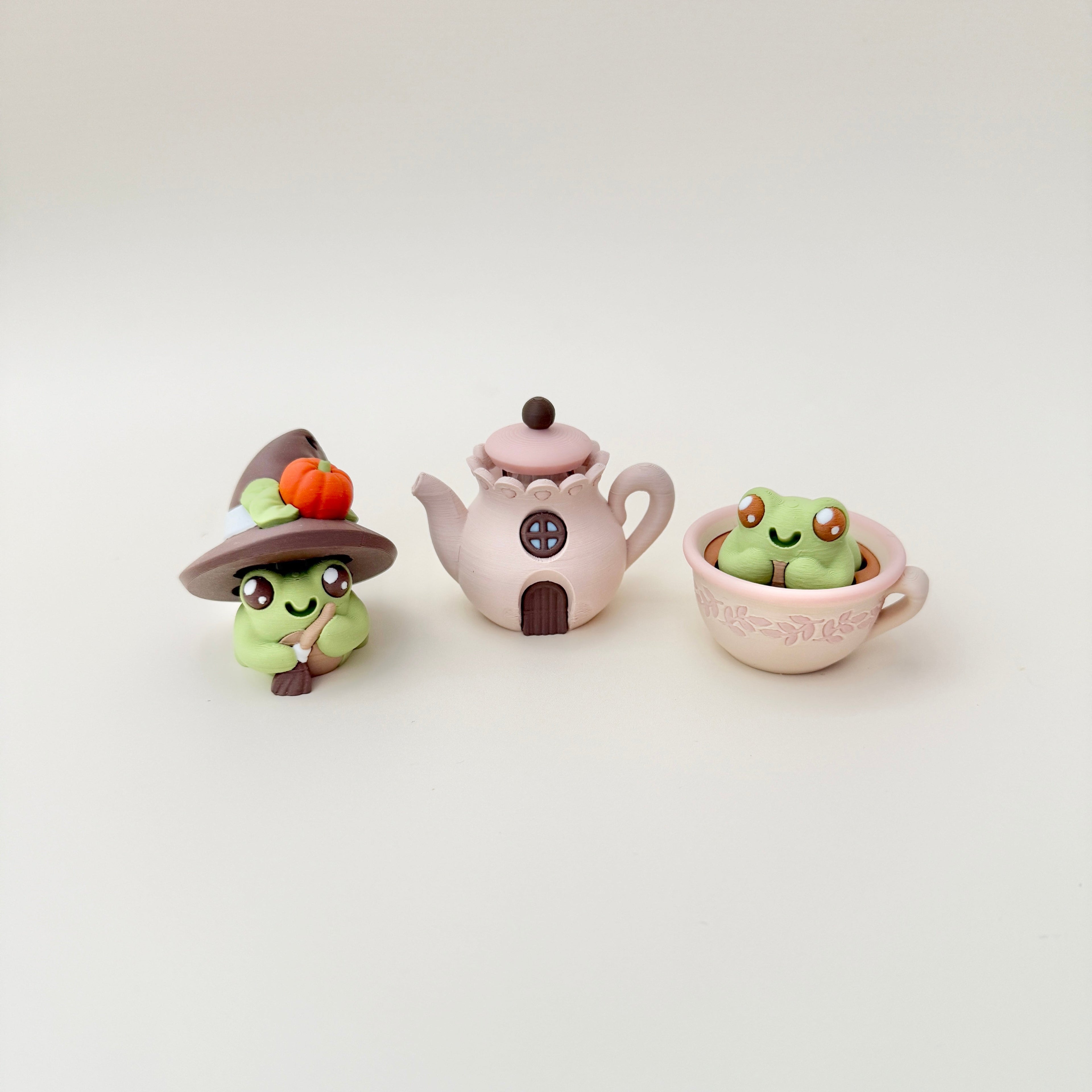 Teapot clicker that pairs with our frog and cottage-themed fidgets for collectors.