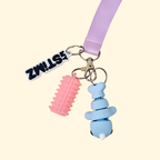 Smooth lanyard attachment with a rounded horn detail for subtle thumb tracing and grounding.
