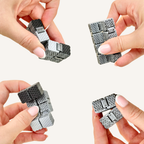 Textured mini FlexiCube in a black grey and white colour shift finish for tactile sensory fidgeting.