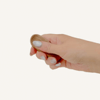 Wood-look magnetic fidget with textured grain finish for one-handed flipping, sliding and tactile sensory input.
