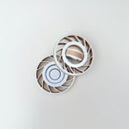Sculpted blade spokes for secure grip and tracing.
