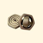 Metallic bronze hex-nut gyro spinner with quiet four-ring rotation.
