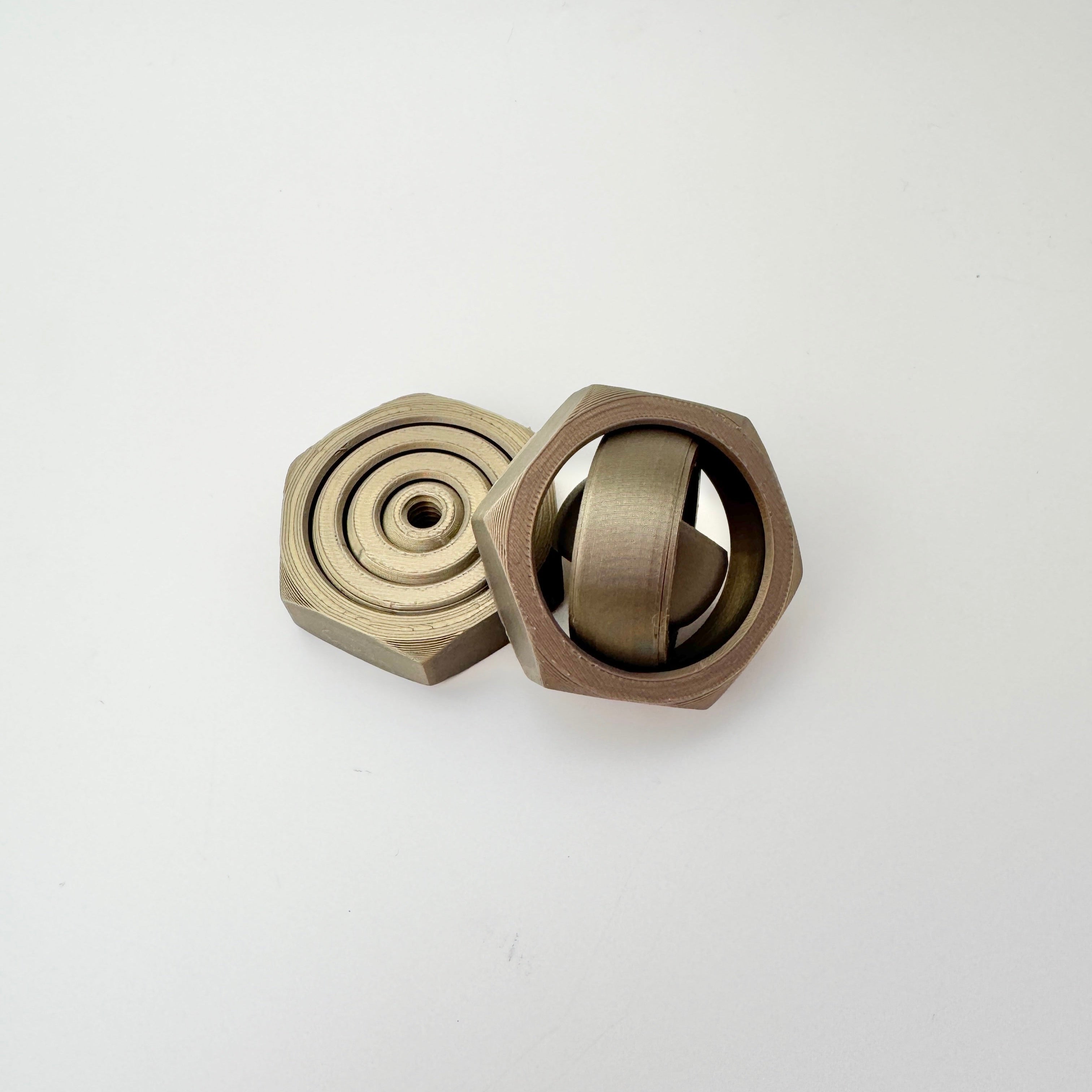 Six-sided nut body offers secure pinch grip and pressure-stim edge.

