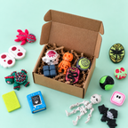 Halloween mystery box filled with a surprise selection of spooky sensory fidgets and Stimz goodies.