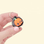 small pumpkin clicker designed for on-the-go stimming and focus
