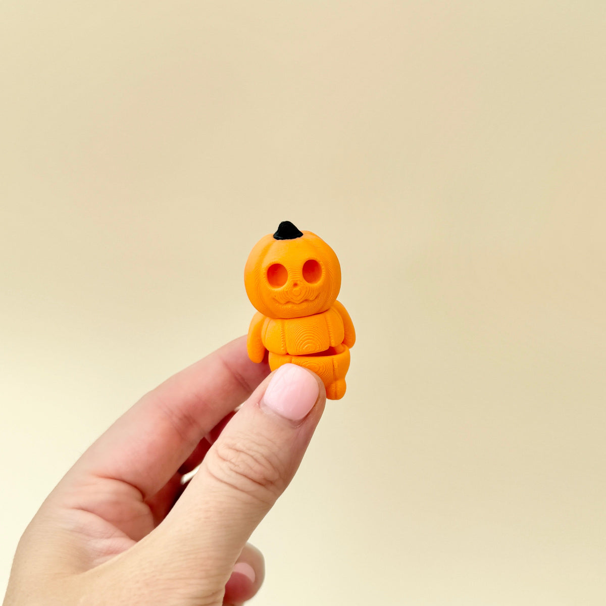 pumpkin-shaped stim toy perfect for spooky season

