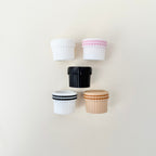 Compact fidget clicker designed for repeated pressing, discreet size, ideal for bags, desks, and on-the-go fidgeting.
