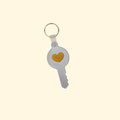 Tap-to-open smart tag for lanyards and keyrings, programmed to call a number, open directions, open a link, or save a contact.
