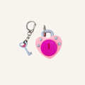 Interactive clicker keyring with heart padlock and movable key for sensory fidgeting and stress relief.
