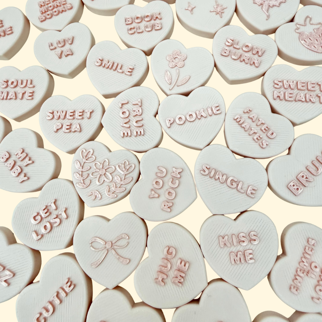 Portable heart-shaped clicker fidget for everyday use
