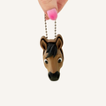 Horse head sensory clicker with metal keyring attachment for bags, keys and portable fidget use.