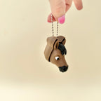 Horse-themed sensory tool with metal attachment, tactile click feedback and neurodivergent-friendly use.