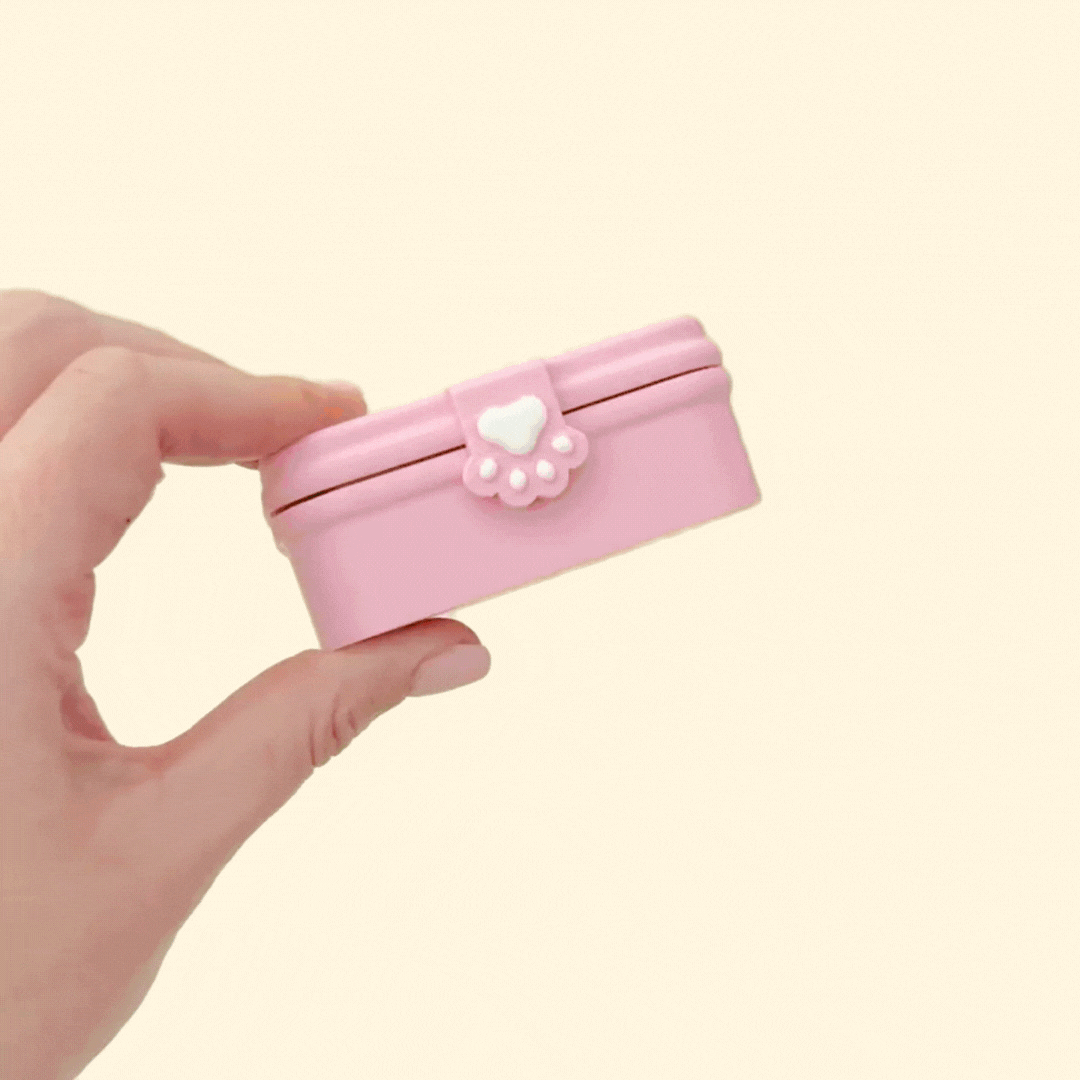 Kawaii bento clicker with three food buttons in a pastel box; portable sensory fidget.
