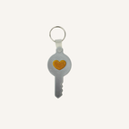 Key shaped NFC accessory from Stimz for sharing chosen digital information through a simple smartphone tap.