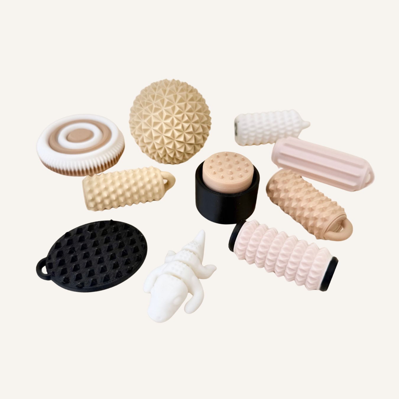 Pressure and texture fidget set with clicker, roller, spinner and mini pet for neurodivergent sensory support.