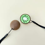 Compact kiwi fidget with raised seeds and satisfying click for focus and relief.

