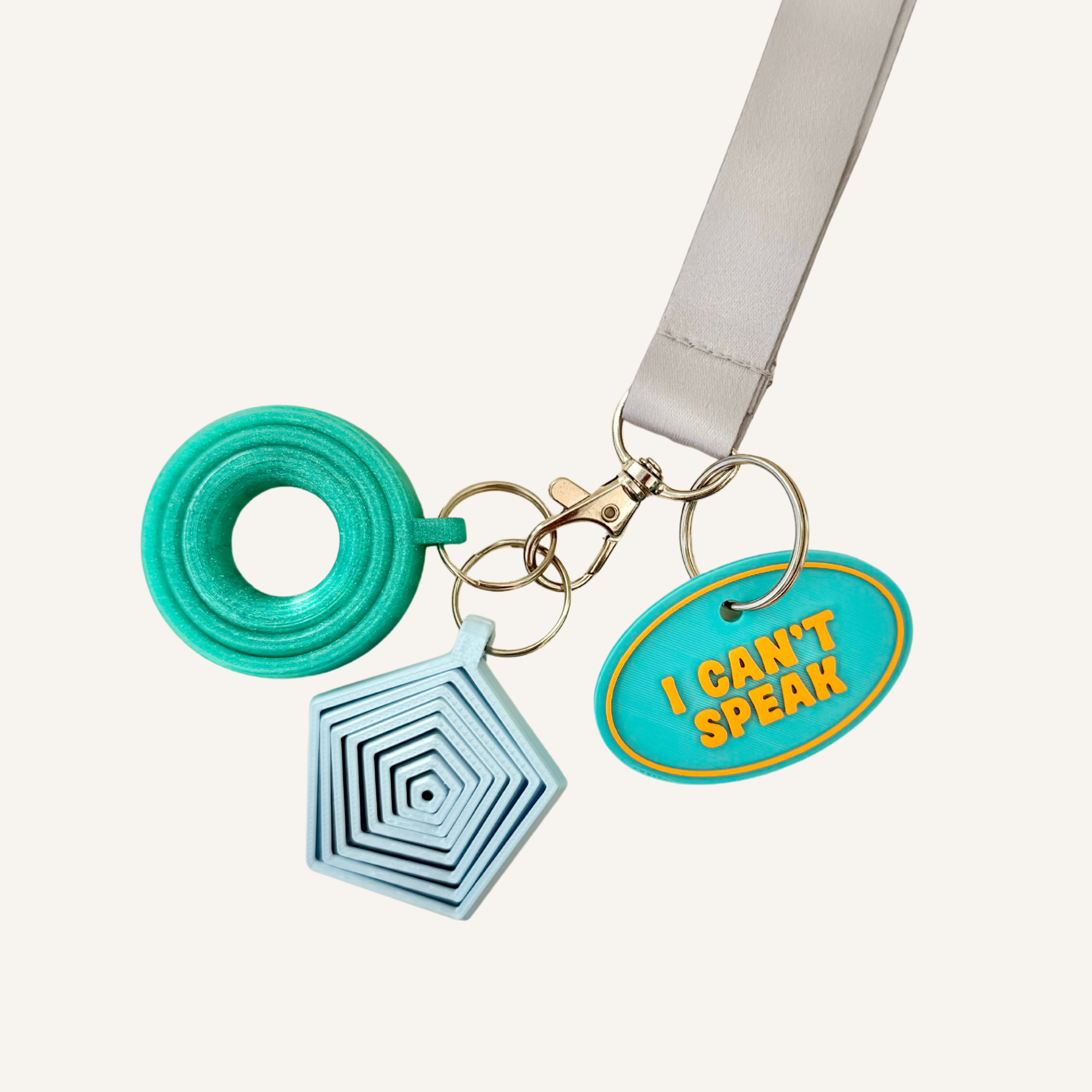 Portable support tag for bags, lanyards, zips and keys with visible text.