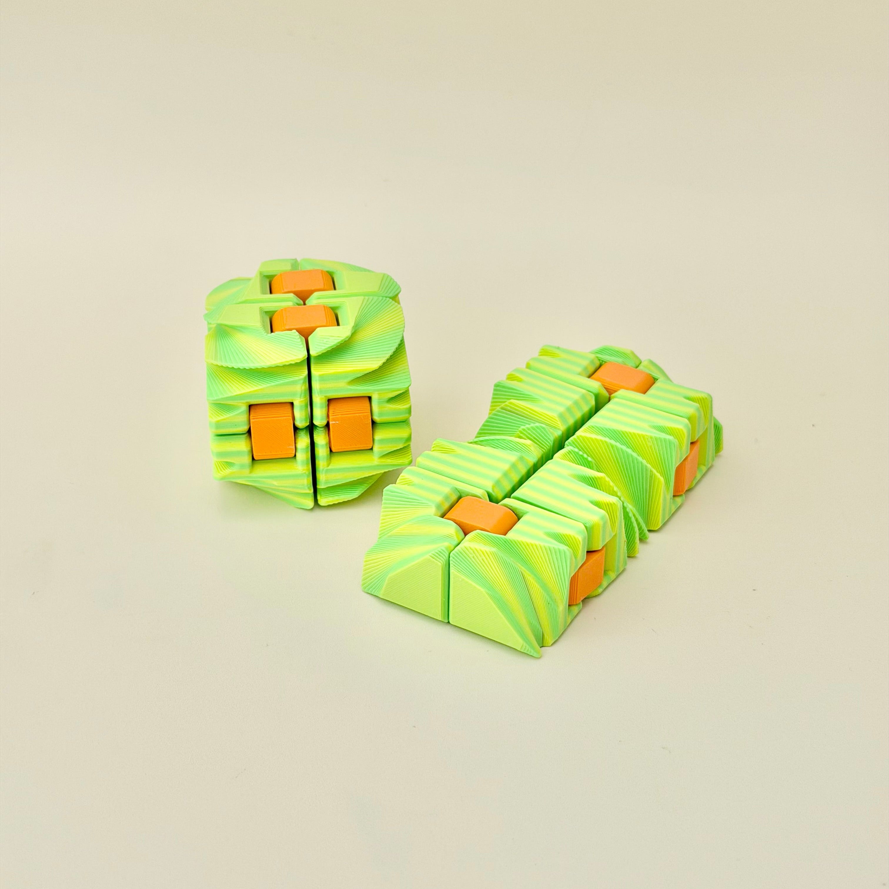 8cm sensory fidget with textured surfaces for desk use, visual interest and busy hands.
