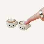 Coffee-shop style clicker fidget with tactile details for busy hands, stimming and focus support.