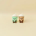 Coffee-style boba cup clicker fidget with a happy face and satisfying press action for busy hands.
