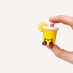 Lemonade cup sensory clicker with pressable feedback, smooth finish and portable fidget use.