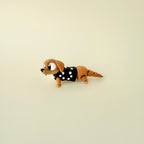 A limited-edition wiggly sausage dog fidget, perfect for anxiety relief and sensory stimulation.