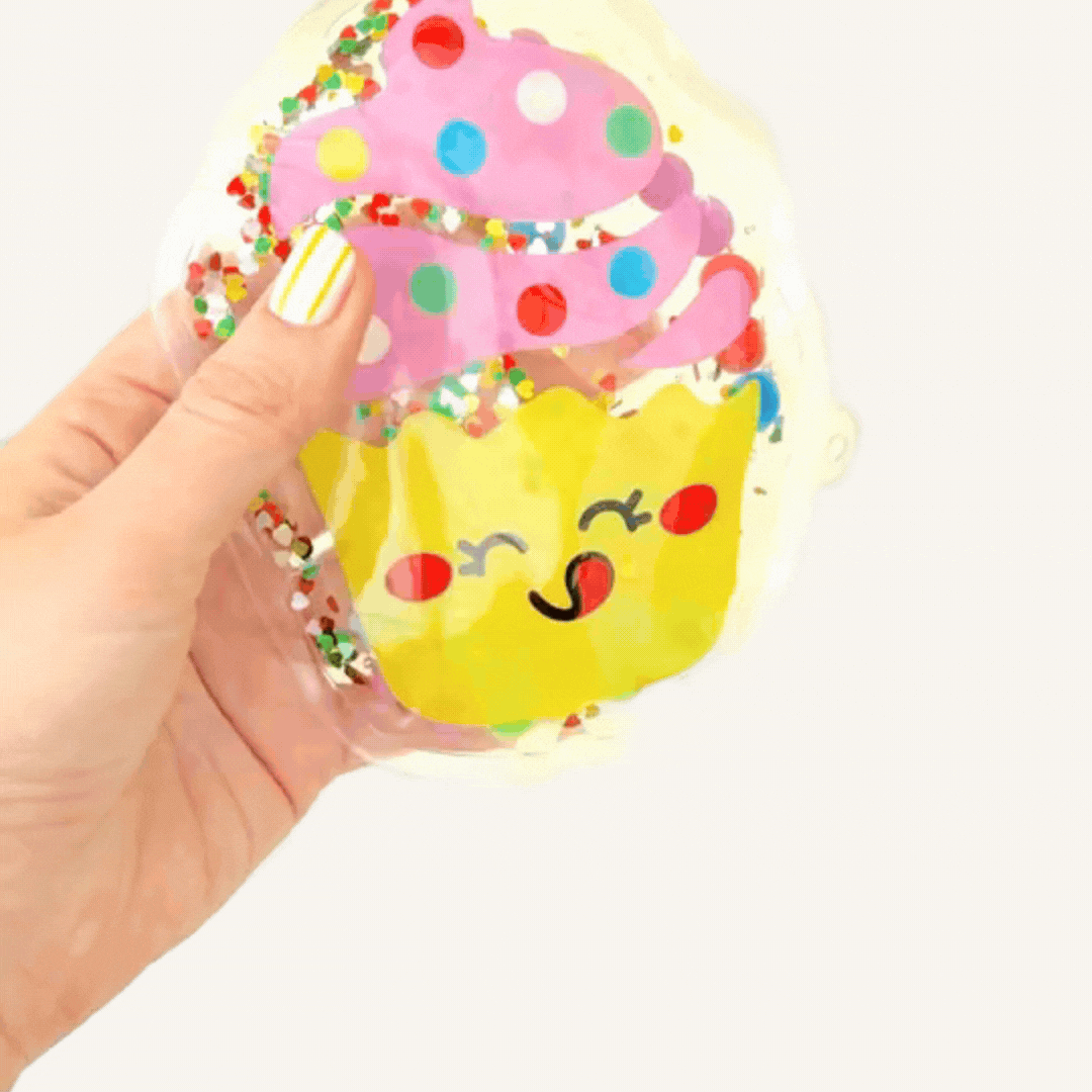 Liquid-filled sensory fidget with moving sparkles and soft pressable texture for calming visual and tactile input.
