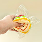Soft squeeze fidget with a smooth feel and cute face, great for calming and sensory regulation.