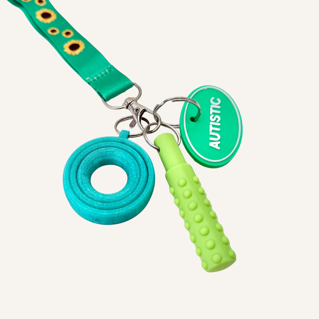 Silicone chew stim with raised texture for light oral sensory input and everyday portable use.
