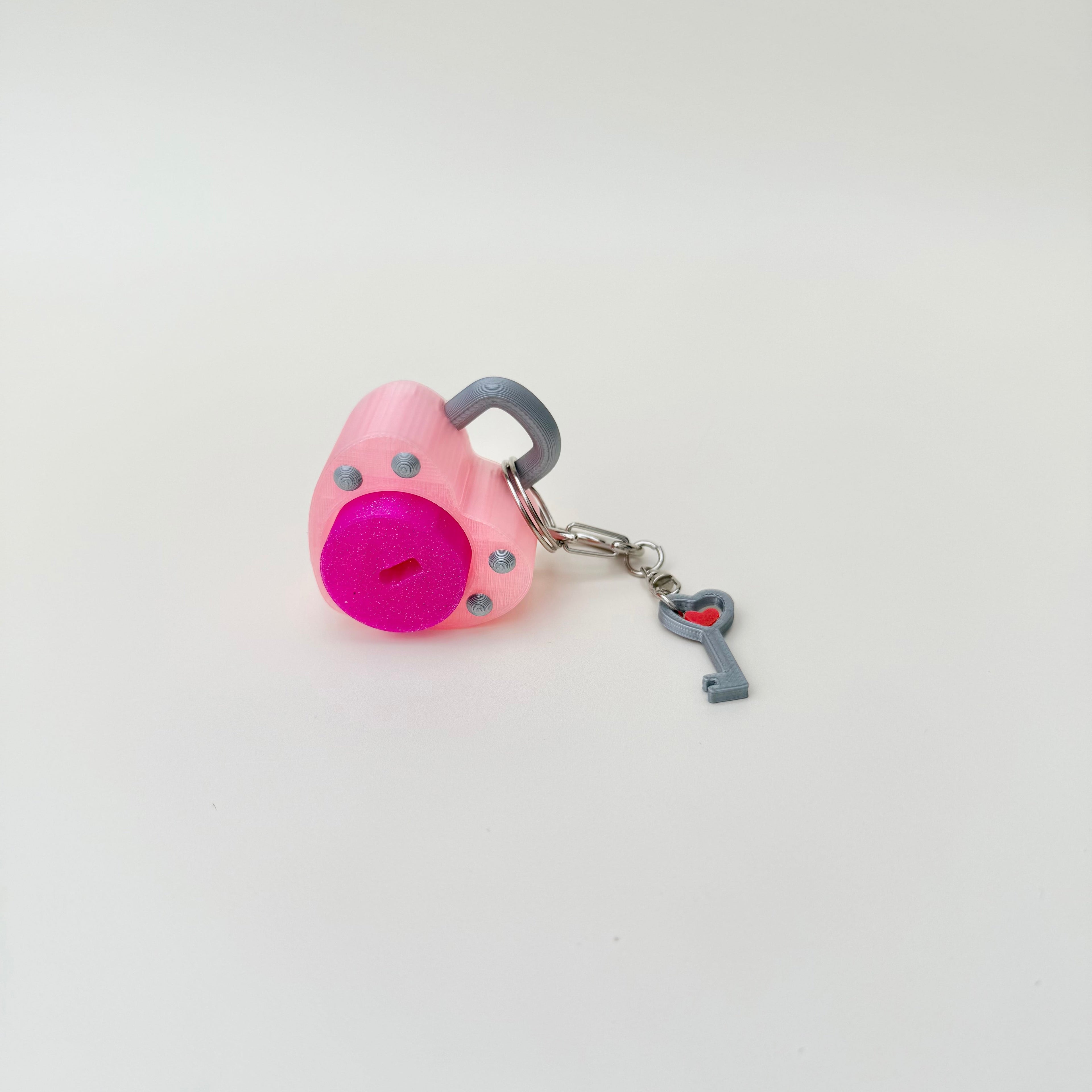 Handheld clicker fidget with key attachment and clip, designed for focus breaks and busy hands.
