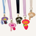 Oval support tag with readable raised lettering and practical keyring loop attachment.