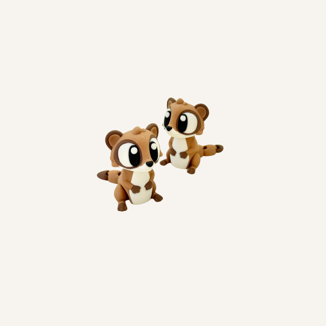 Cute meerkat sensory fidget with articulated tail and moving head for busy hands and tactile play.