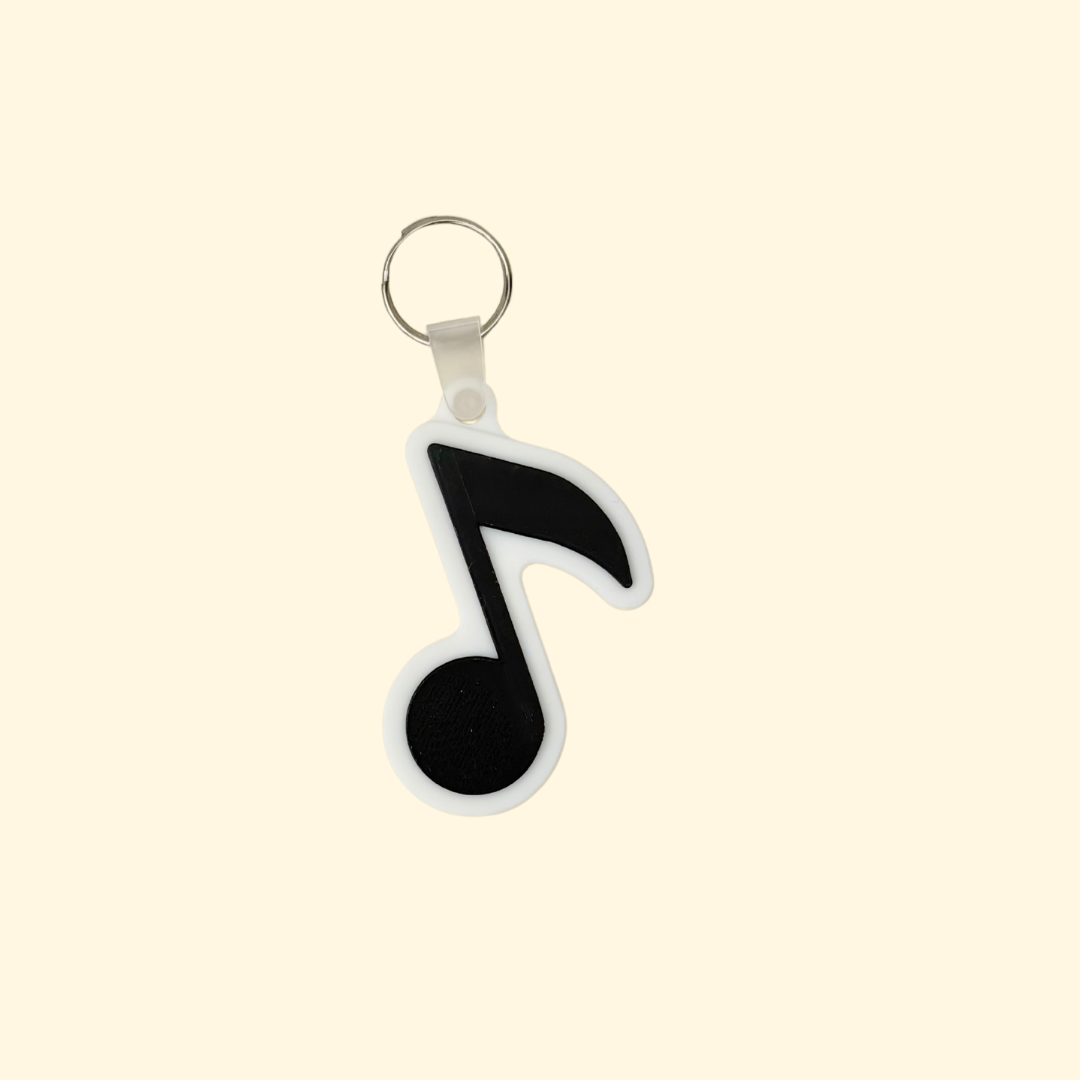 Tap-to-open keyring charm that triggers a chosen call, directions, link, or contact with one phone tap.
