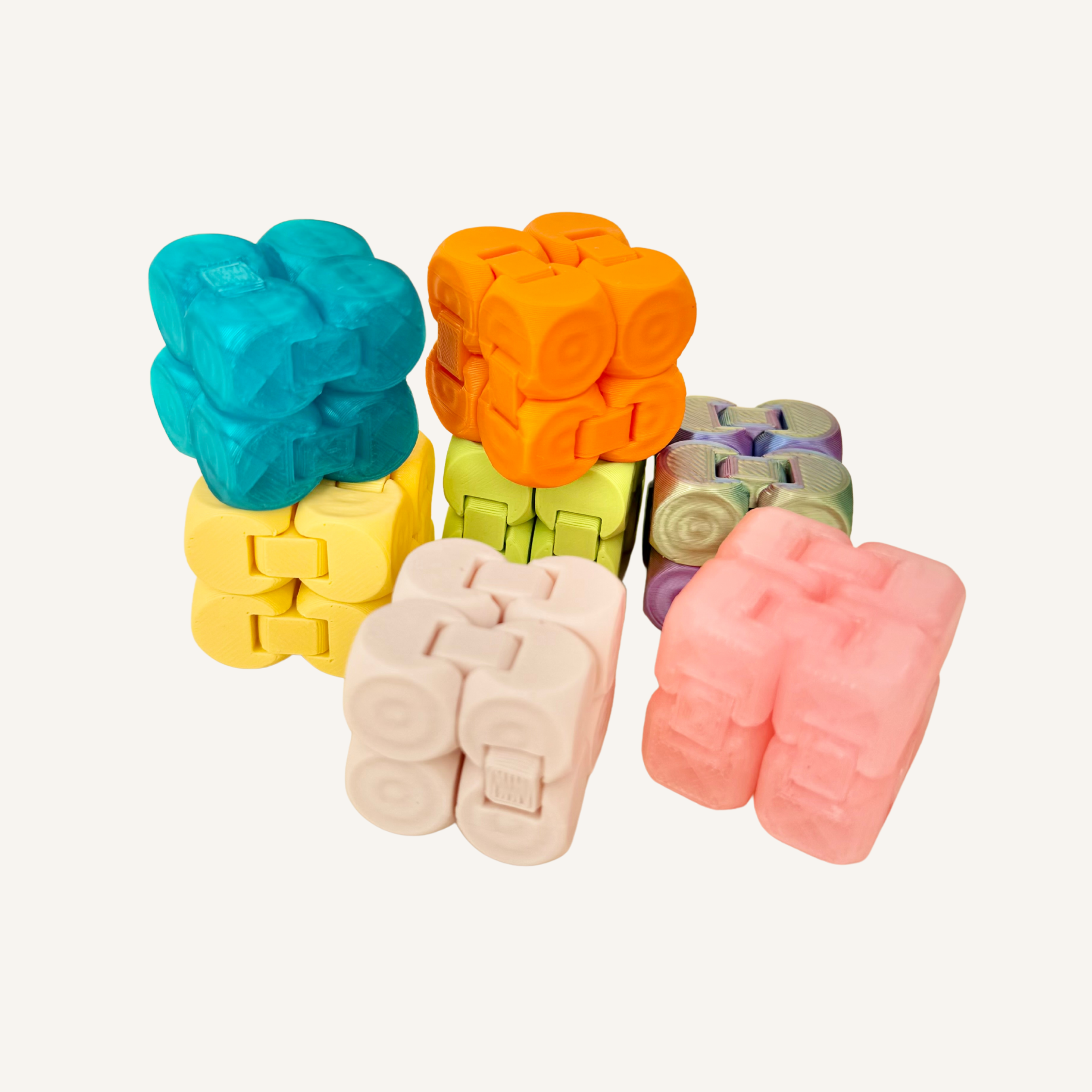 Pocket-size infinity cube fidget with flip-and-fold movement for one-handed stimming, focus and calming sensory input.

