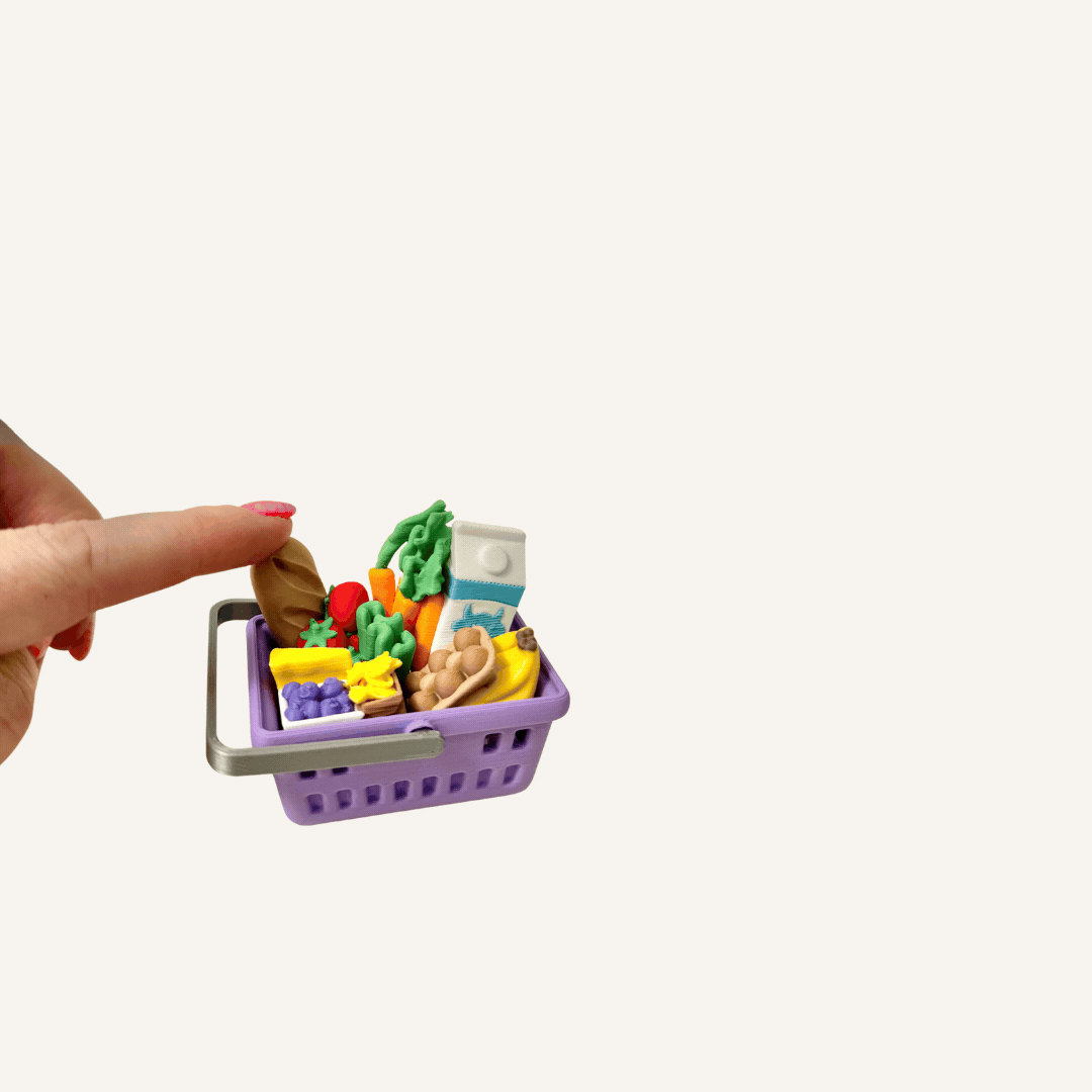 Shopping basket sensory fidget filled with miniature food items and realistic textures.