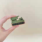 Handheld tracked clicker fidget with detailed design and optional quiet click upgrade for calmer use.
