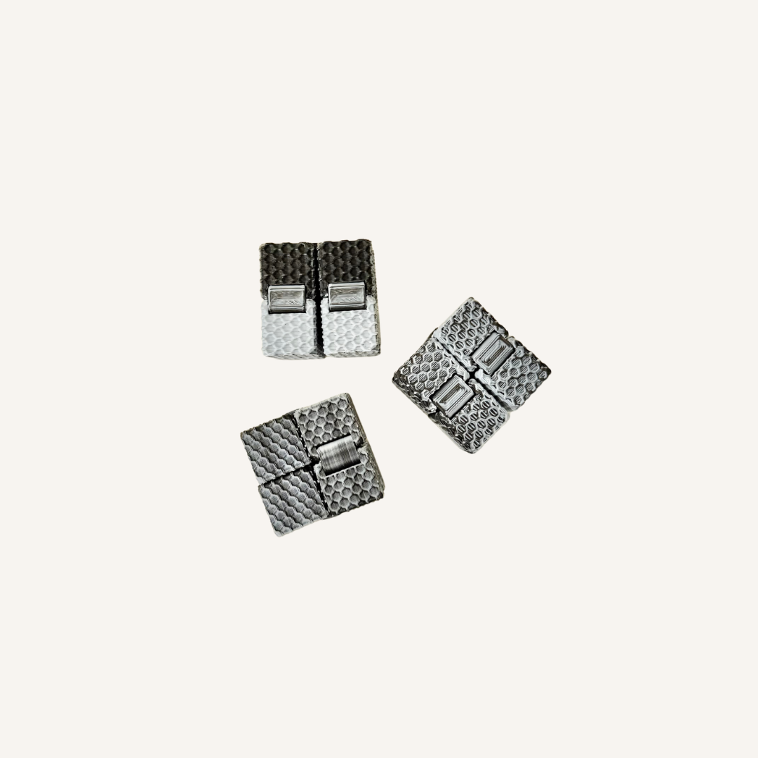Small tactile FlexiCube designed for continuous flipping folding and repetitive hand movement.