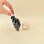 Compact rotating spiral fidget with tactile ridges for stimming, focus, and anxiety relief.
