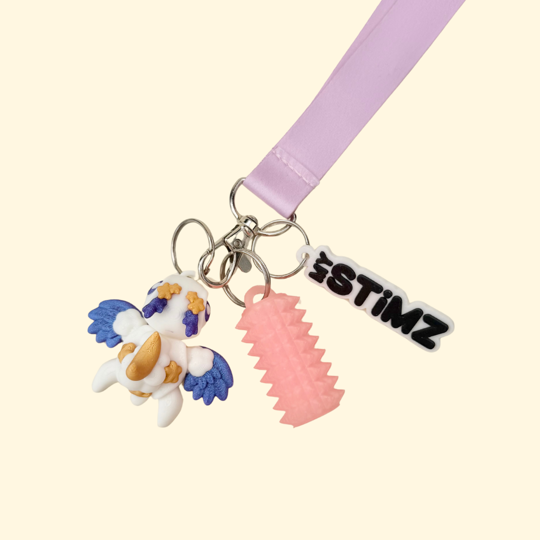 Compact turtle fidget featuring raised moon detail for subtle pressure input and finger tracing.
