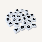 Custom sensory clicker with multiple letter buttons for repetitive pressing, focus support and stimming.
