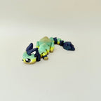 Long articulated creature fidget designed for busy hands, desk play and sensory regulation.
