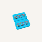 Two tactile blue fidget magnets with colourful raised artwork and magnetic snap together design