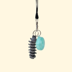 Centipede lanyard add-on with smooth texture and high articulation for soothing repetitive movement and stimming.
