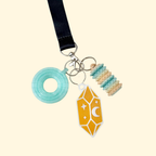 Discreet keyring add-on for bags and coats, designed for fast support access when you’re out and about.
