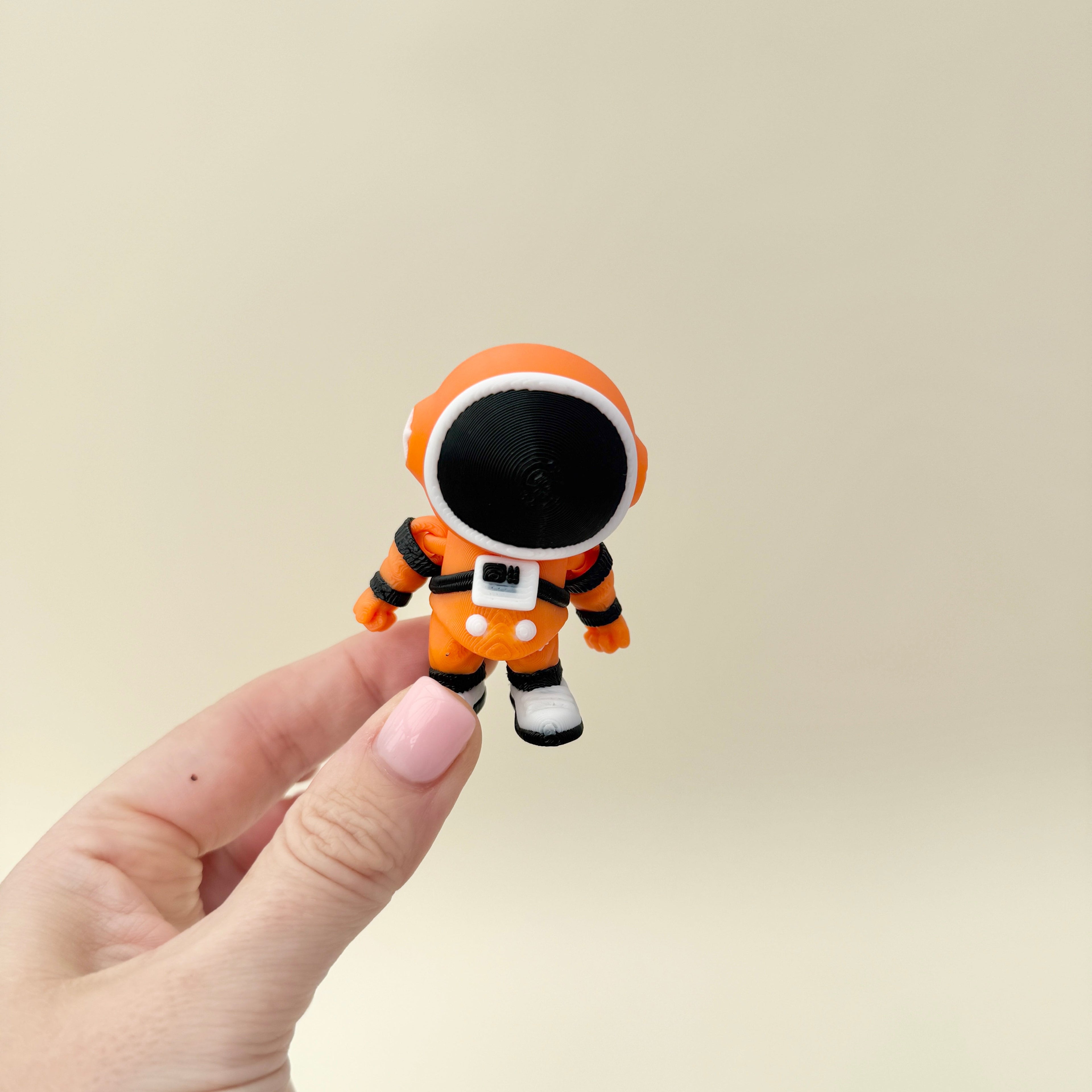 Pocket-size figure that stands out as a fun desk companion.
