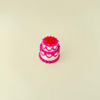 small cake shaped clicker toy for neurodivergent users and collectors
