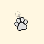 Tap-to-open smart tag for lanyards and keyrings, programmed to call a number, open directions, open a link, or save a contact.
