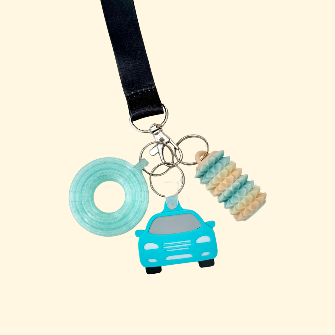 Discreet keyring add-on for bags and coats, designed for quick contact or map access for school runs and travel days.
