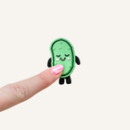 Pocket-sized pickle sensory fidget for tactile input, focus support and busy hands.