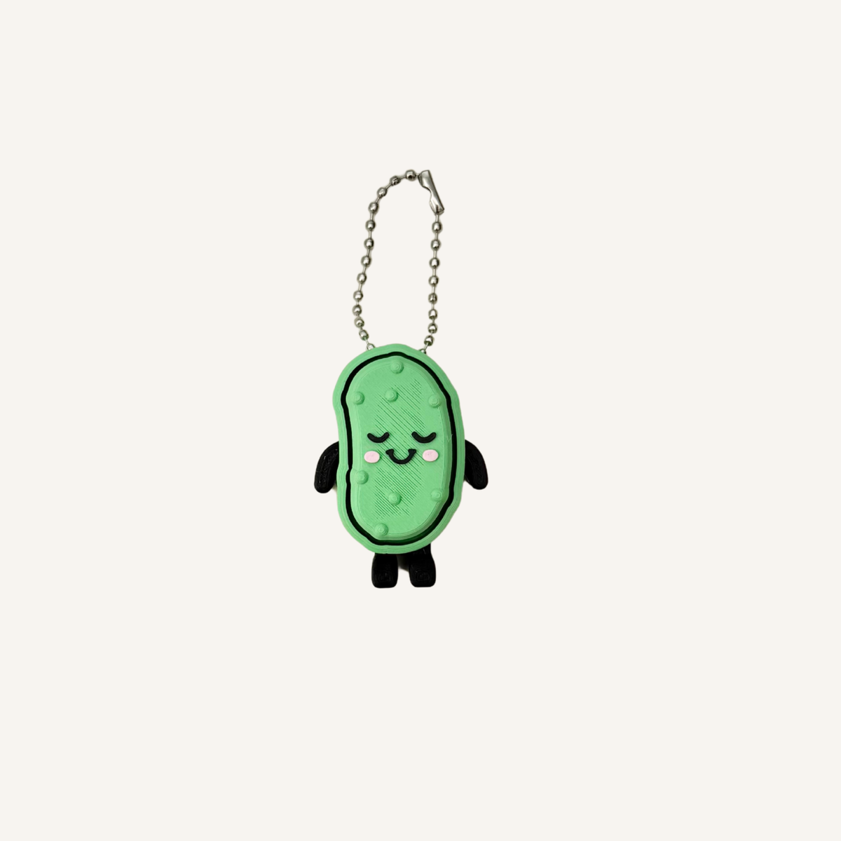 Portable pickle sensory fidget for bags, desks and on-the-go sensory support.